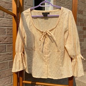 vintage buttercup yellow blouse with embroidered flowers